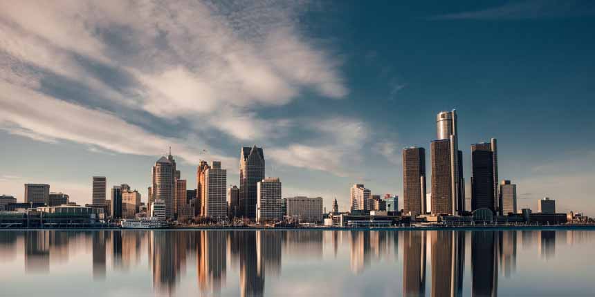 - JOSEPH Advanced Oculofacial Plastic Surgery Detroit sykline showing skyscrapers reflecting off Detroit river